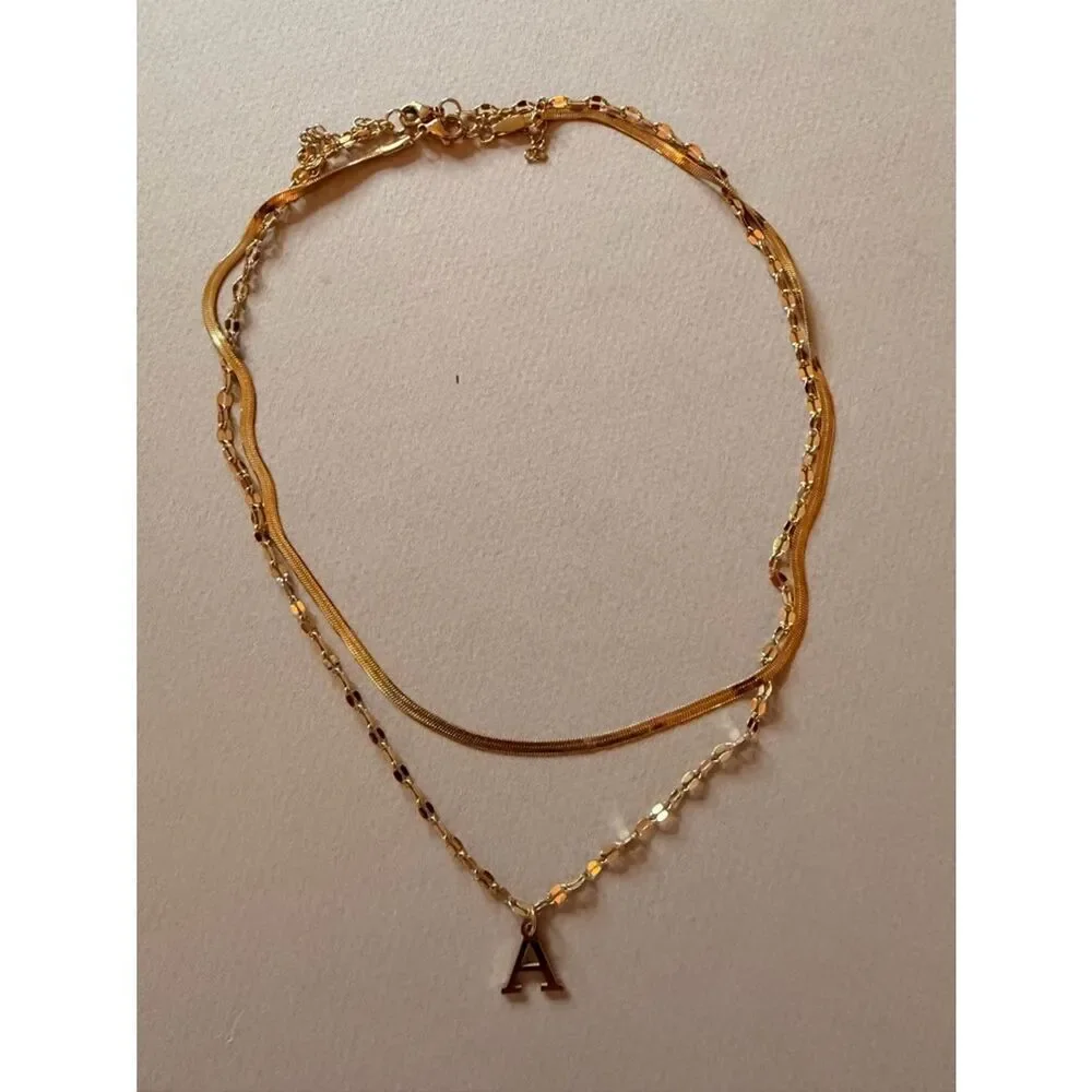 Anthropologie elegant gold